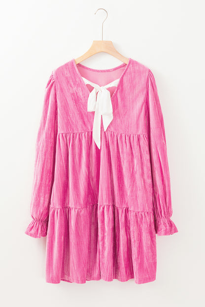 Playful strawberry pink velvet mini dress with flounce sleeves and tiered ruffles