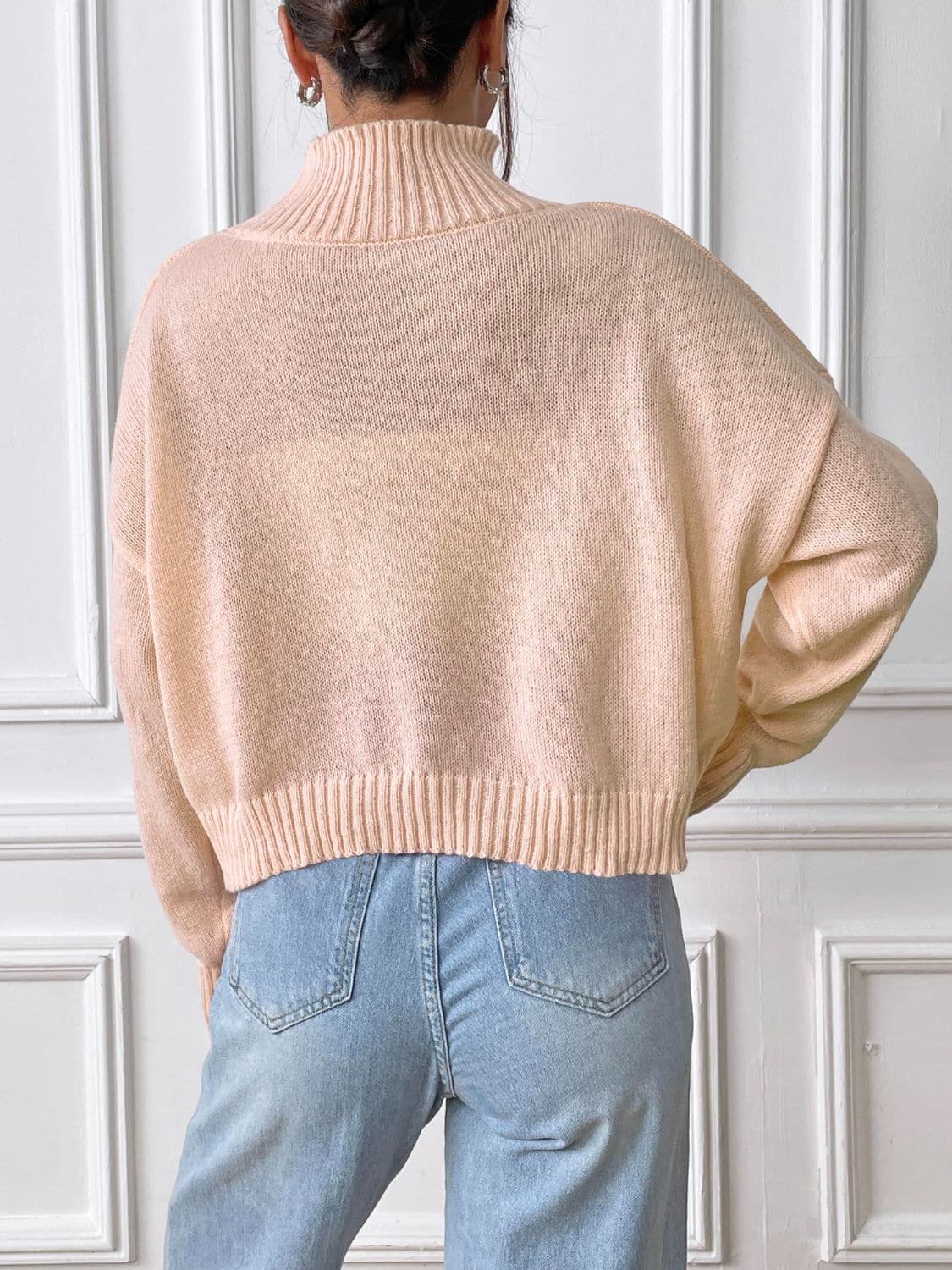 Charming heart turtleneck sweater for cozy elegance