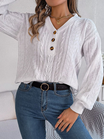 Chic cable-knit v-neck sweater with buttoned details