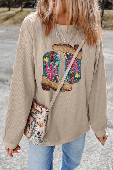 Sparkling sequin boots paired with a stylish round neck sweatshirt