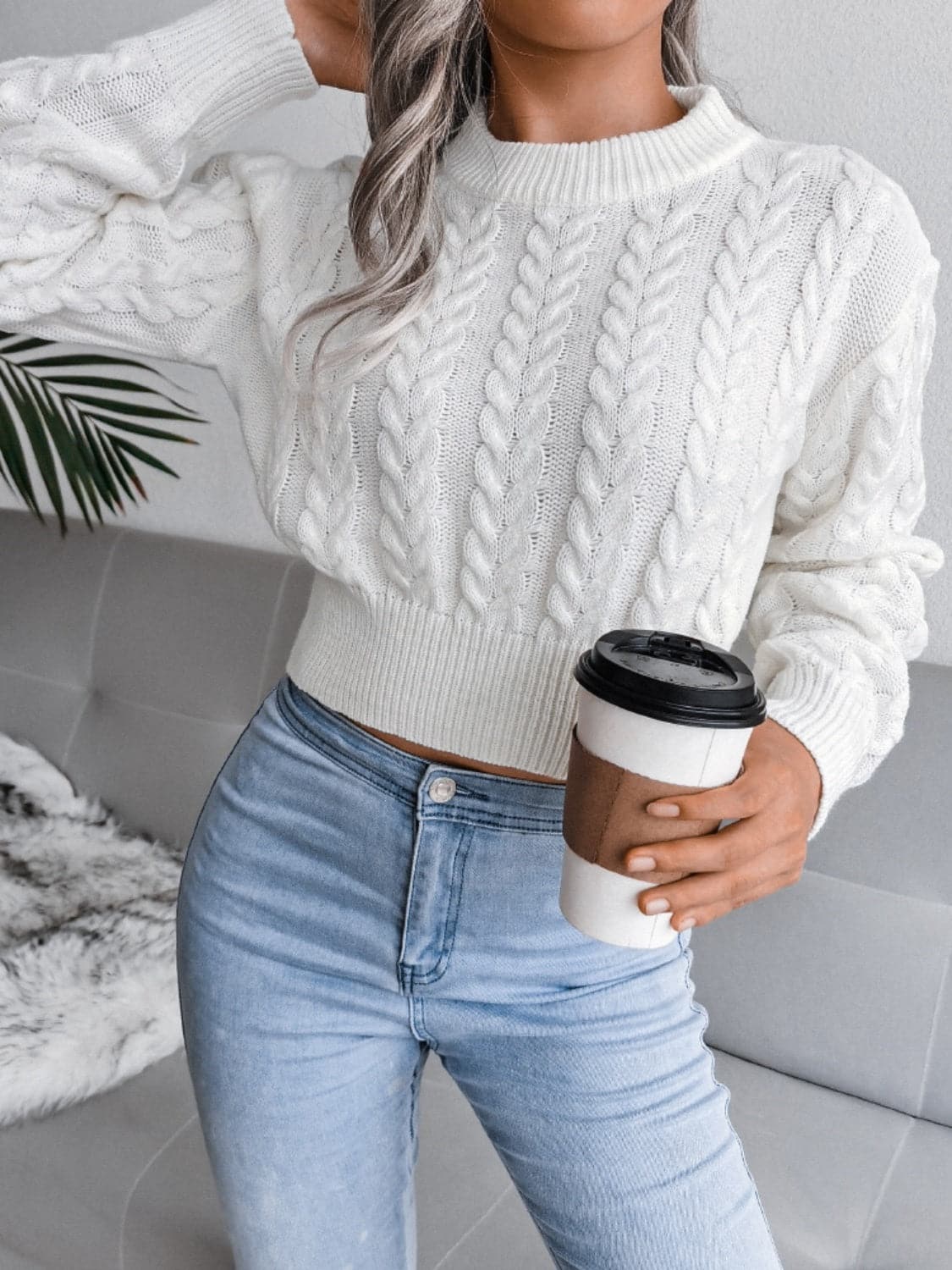 Cable-Knit Round Neck Sweater.