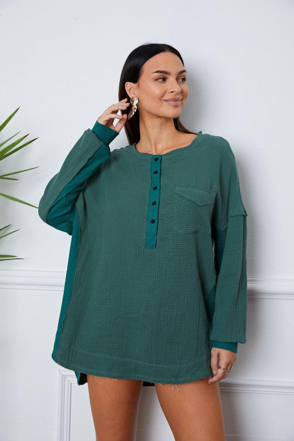 Half Button Up Round Neck BlouseHalf Button Up Round Neck Blouse
 Step up your style game with our Half Button Up Round Neck Blouse, a versatile piece that blends elegance with comfort effortlesslyLove Salve Round Neck BlouseBlouses