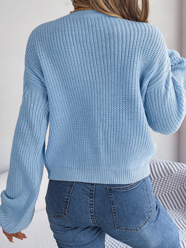 Cable-Knit Round Neck Drop Shoulder Sweater.