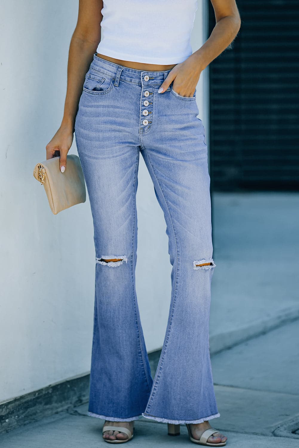 Button-Fly Distressed Raw Hem Flare Jeans.