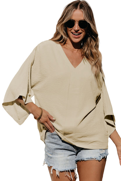 Parchment V neck crinkled blouse with wide sleeves