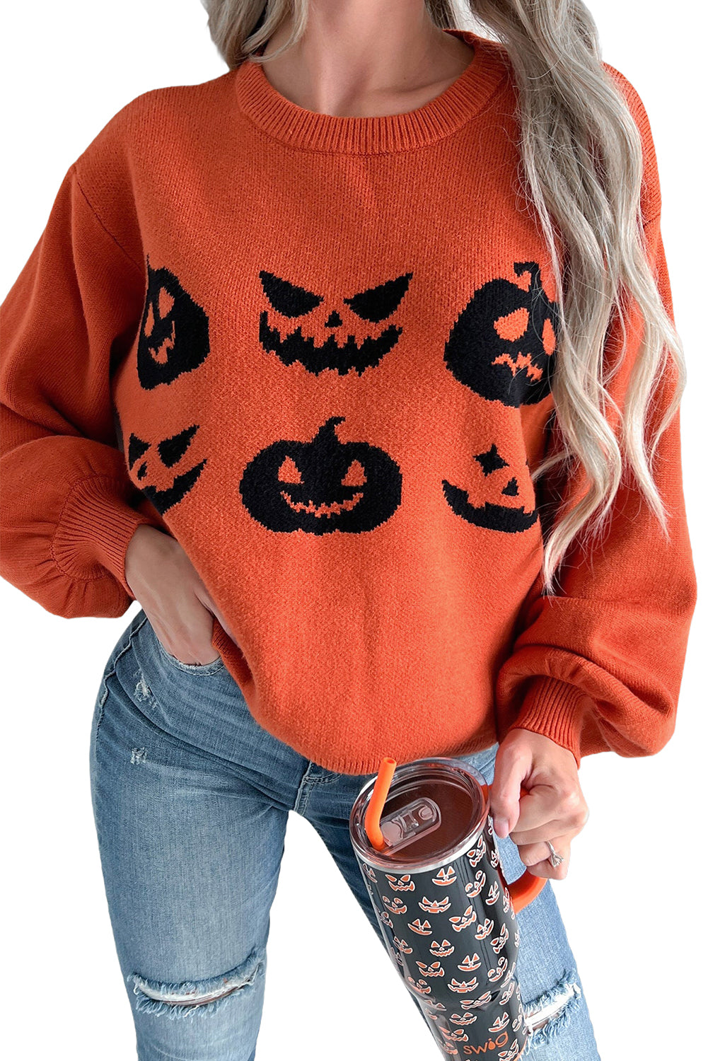 Spooky pumpkin face drop shoulder sweater for Halloween fun