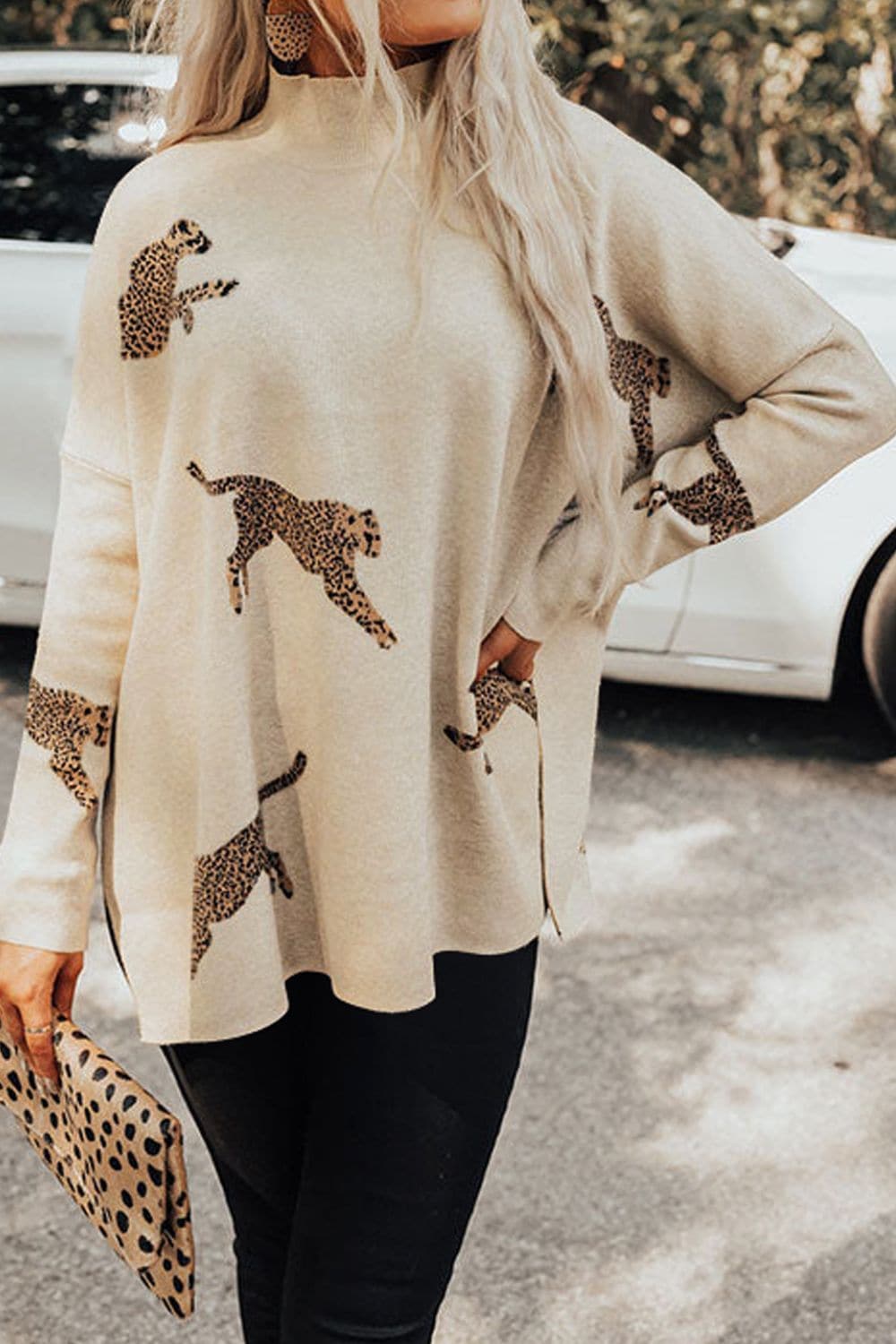 Wild print mock neck long sleeve sweater with leopard design.