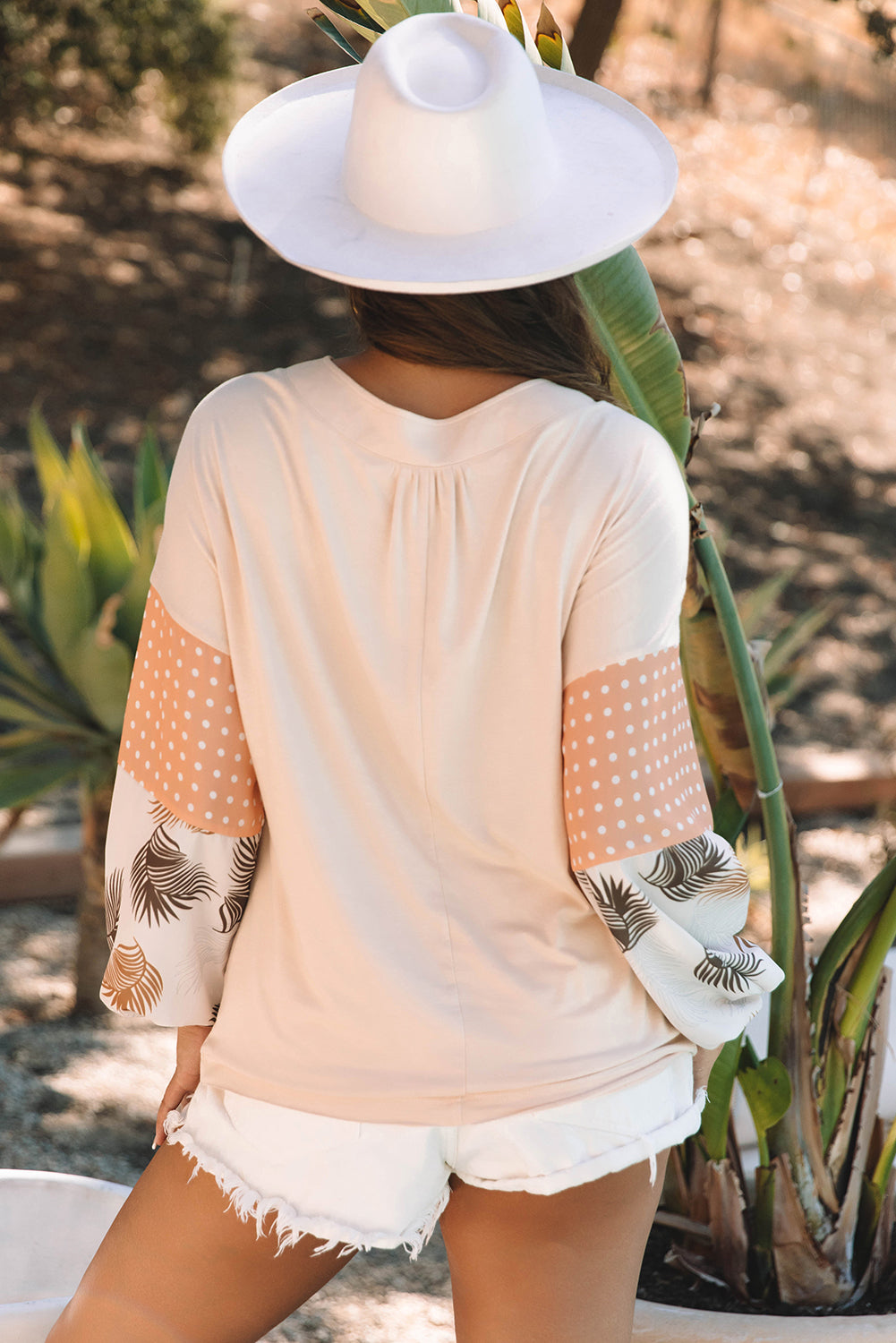 Chic palm print blouse with puff sleeves