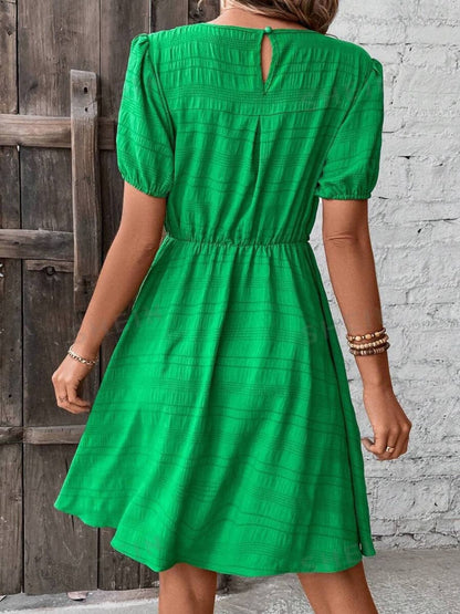 Ruched Round Neck Short Sleeve Mini Dress.