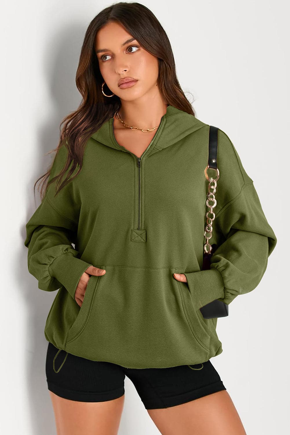 Sheer pocketed half zip hoodie for a stylish look