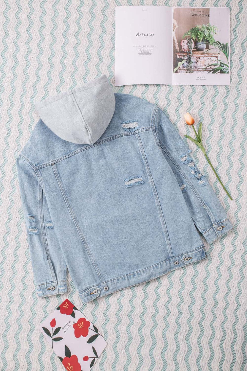 Distressed Hooded Denim Jacket.