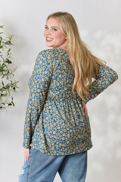 Heimish Full Size Floral Half Button Long Sleeve Blouse.