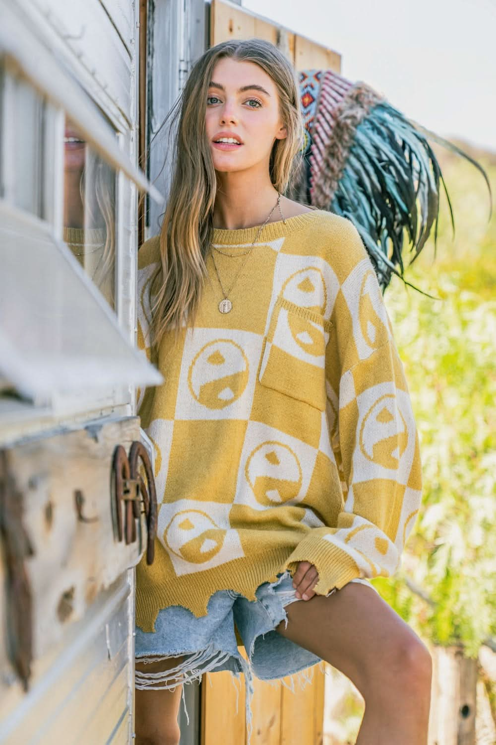 Yin Yang checkerboard pullover sweater with relaxed fit