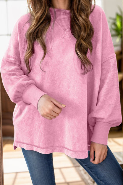 Round Neck Dropped Shoulder Sweatshirt.