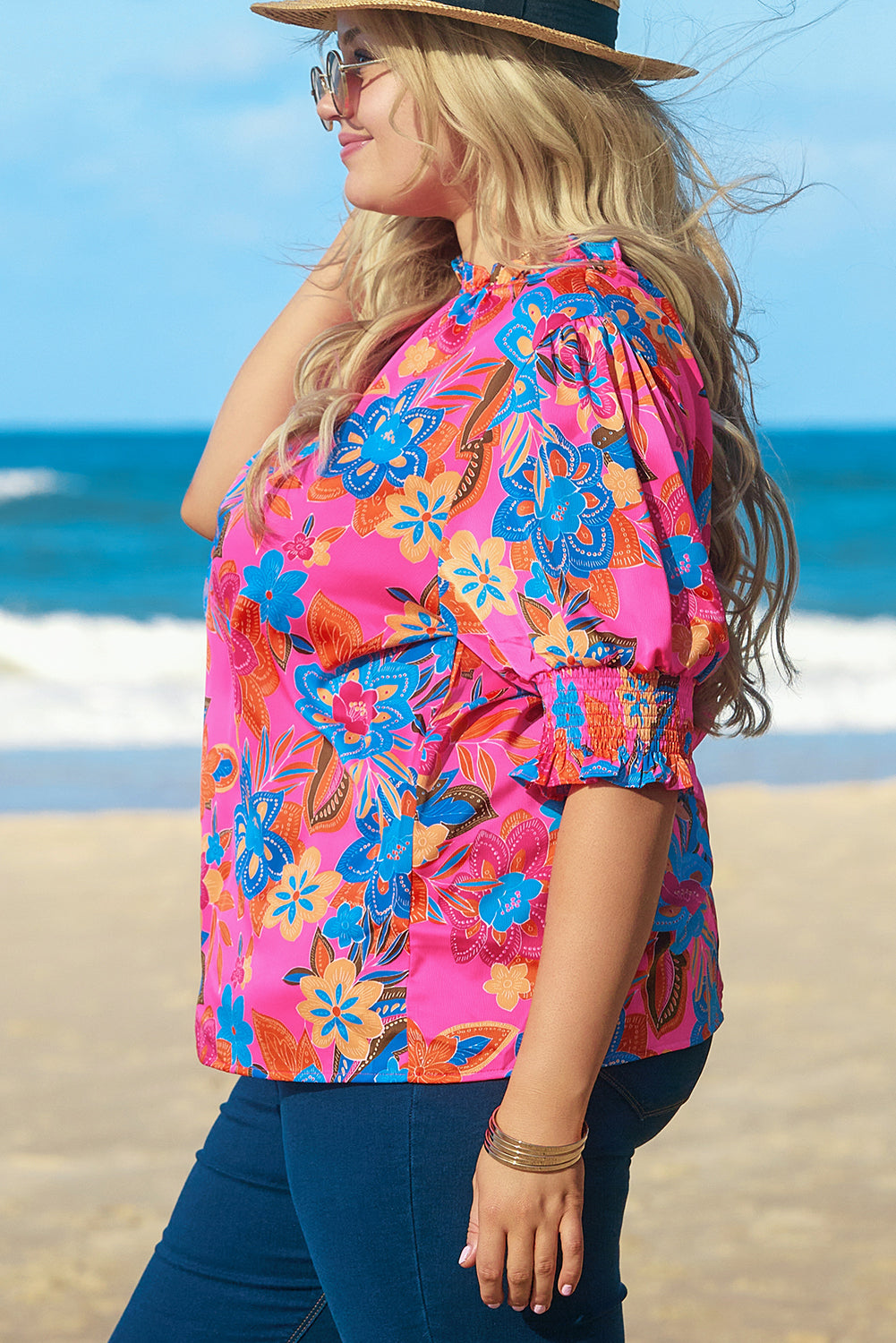 Chic floral print blouse with frilly neck and puff sleeves