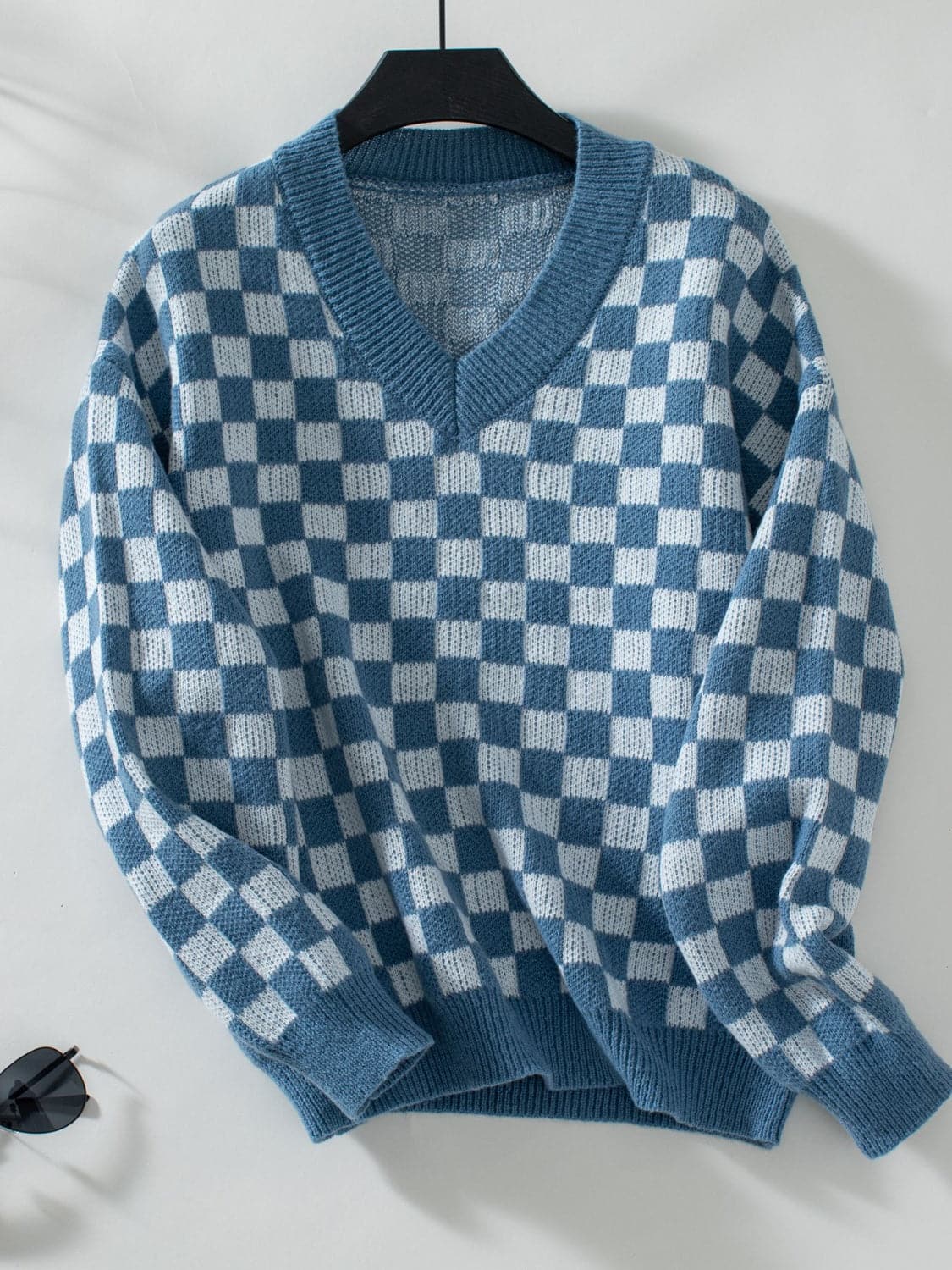 Vibrant checkered v-neck sweater with dropped shoulders