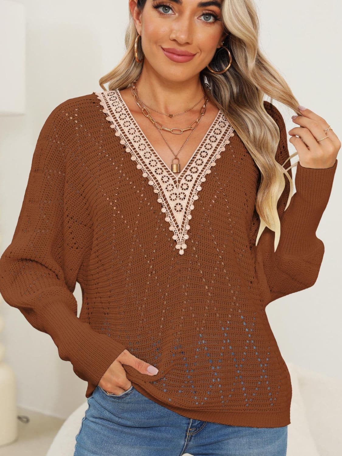 Lace-accented v-neck long sleeve knit sweater