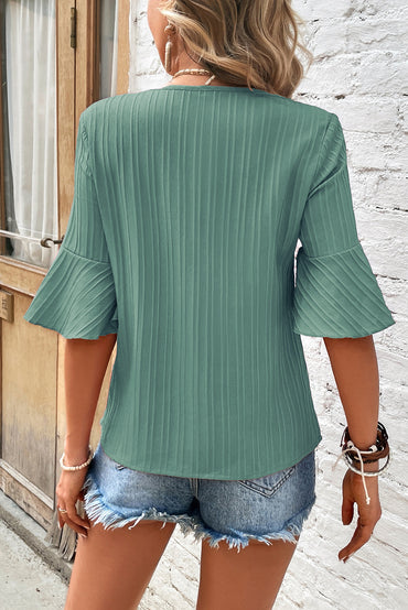 Chic grass green ruffled top with half sleeves and v-neck detail