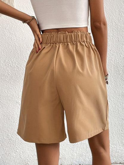 Pocketed Half Elastic Waist Shorts.