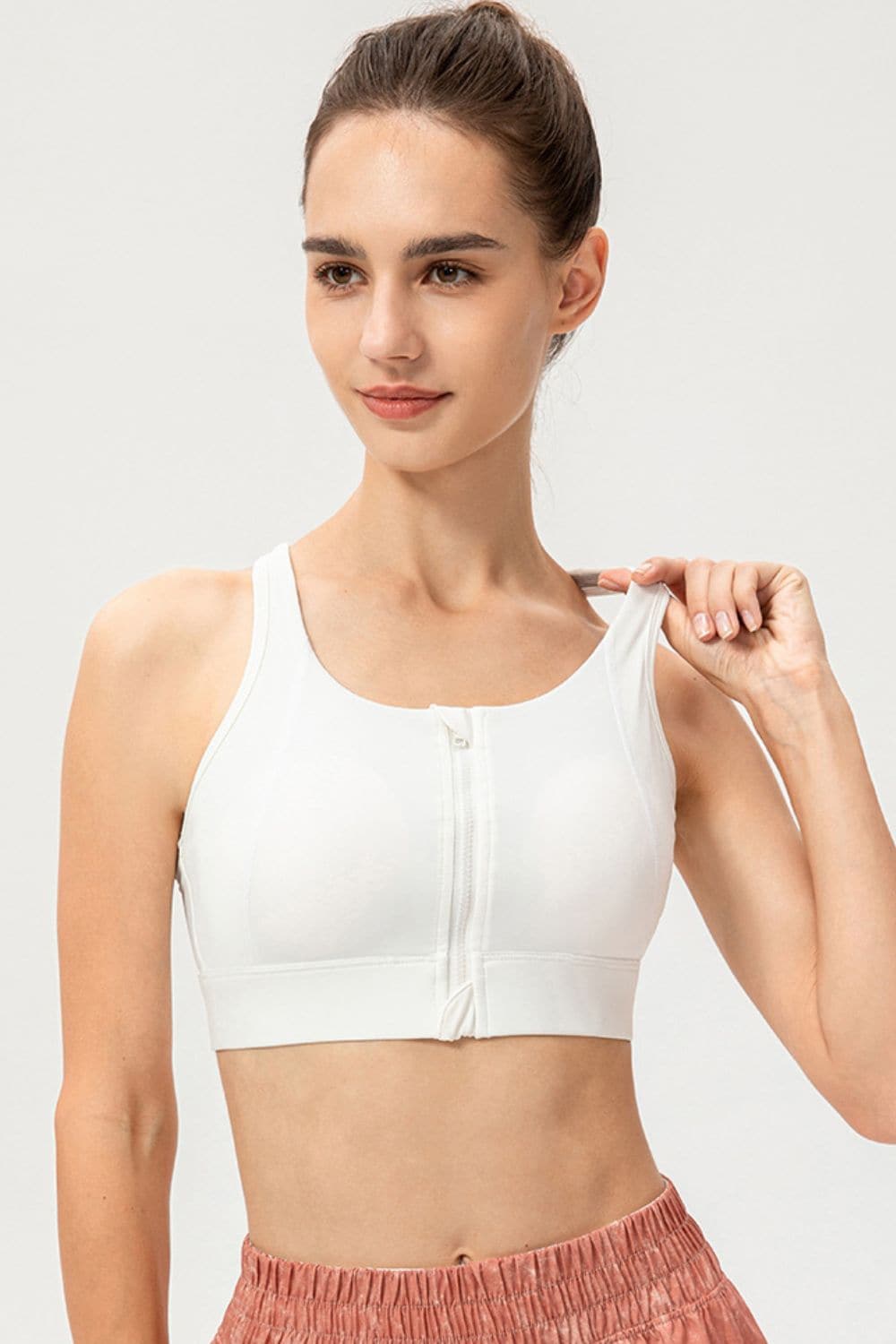 Zip-Up Round Neck Sports Bra.