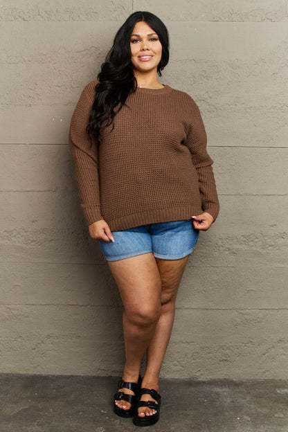 Zenana Breezy Days Plus Size High Low Waffle Knit SweaterStay Cozy in Style
 The Zenana Breezy Days Plus Size High Low Waffle Knit Sweater is not just an ordinary sweater; it is your essential companion for the colder montLove Salve Size High Low Waffle Knit Sweatercloseout