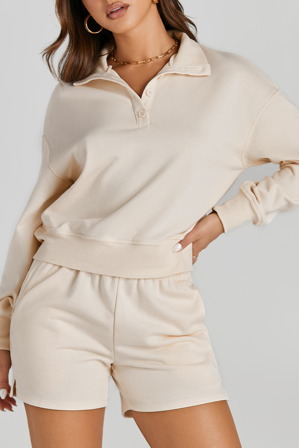 Chic apricot high neck henley top and shorts set