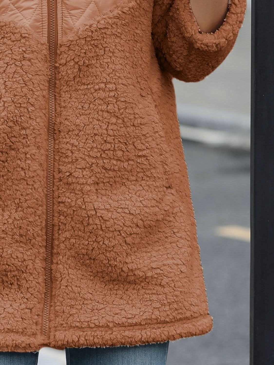 Brown cozy fleece hooded jacket with pockets, 100% polyester.