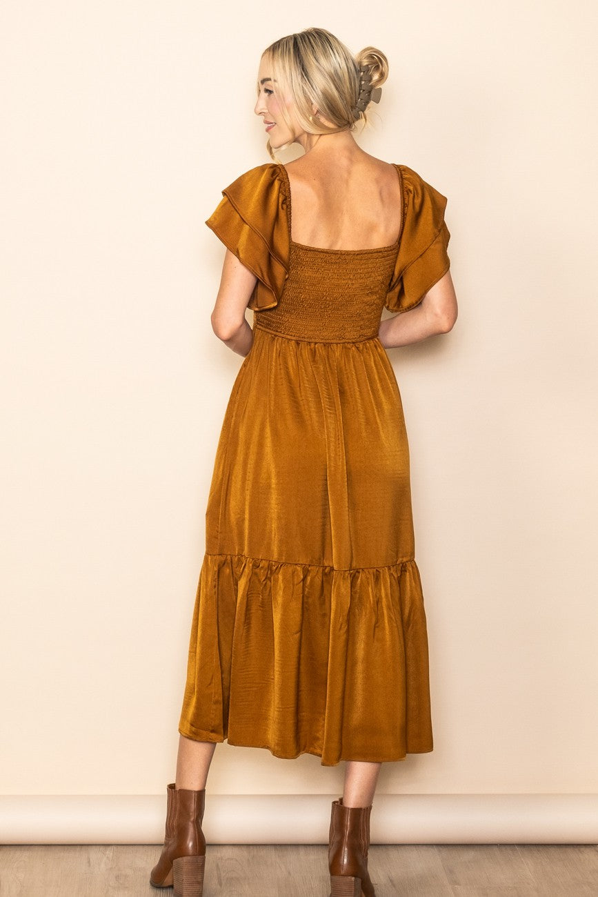 PinkBlush Camel Satin Flutter Sleeve Midi Dress, featuring the stylish ruffle hem and practical side pockets detail.