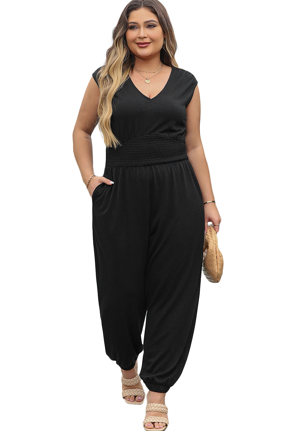 Plus size black smocked jumpsuit