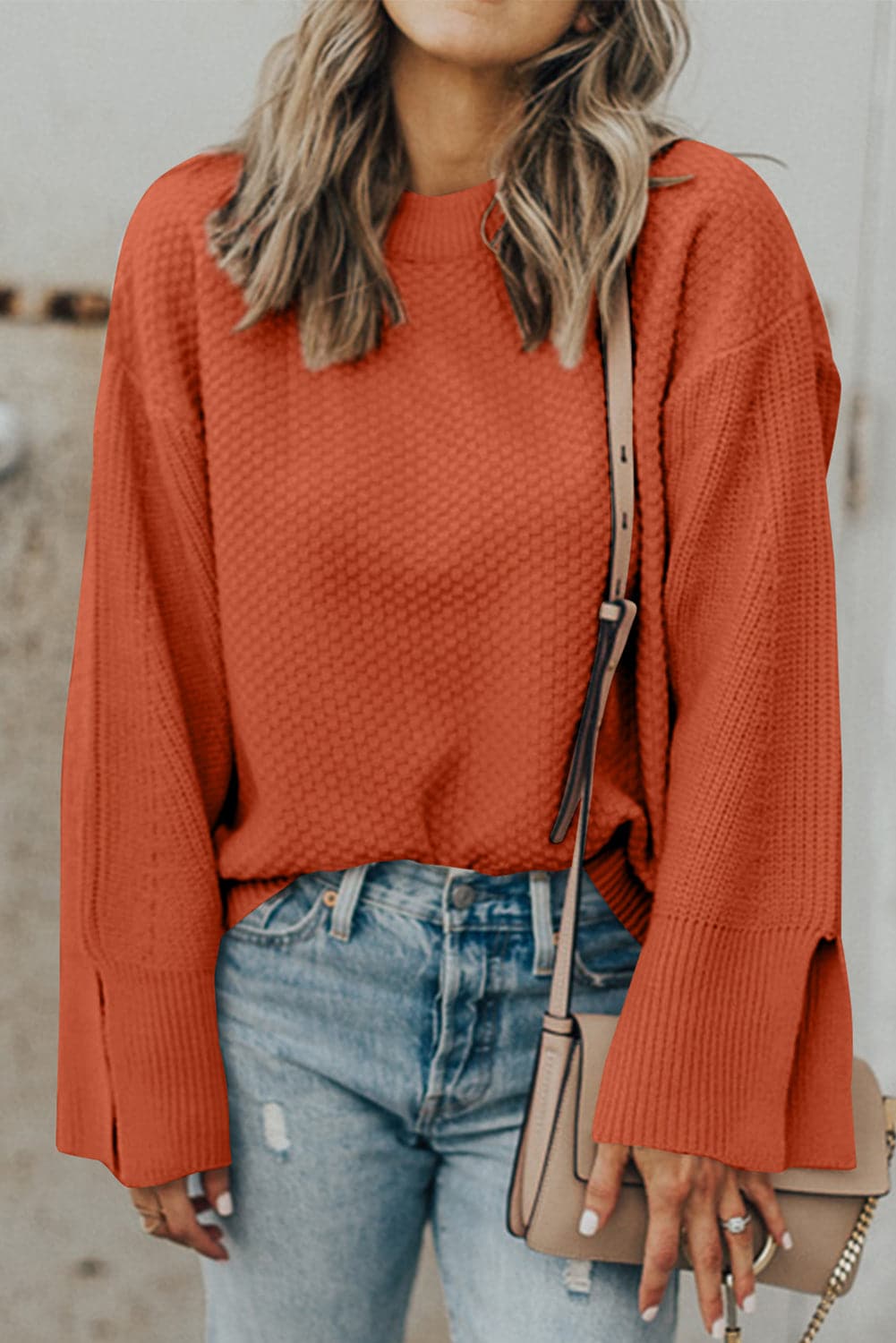 Chic textured long sleeve sweater with stylish slit detail