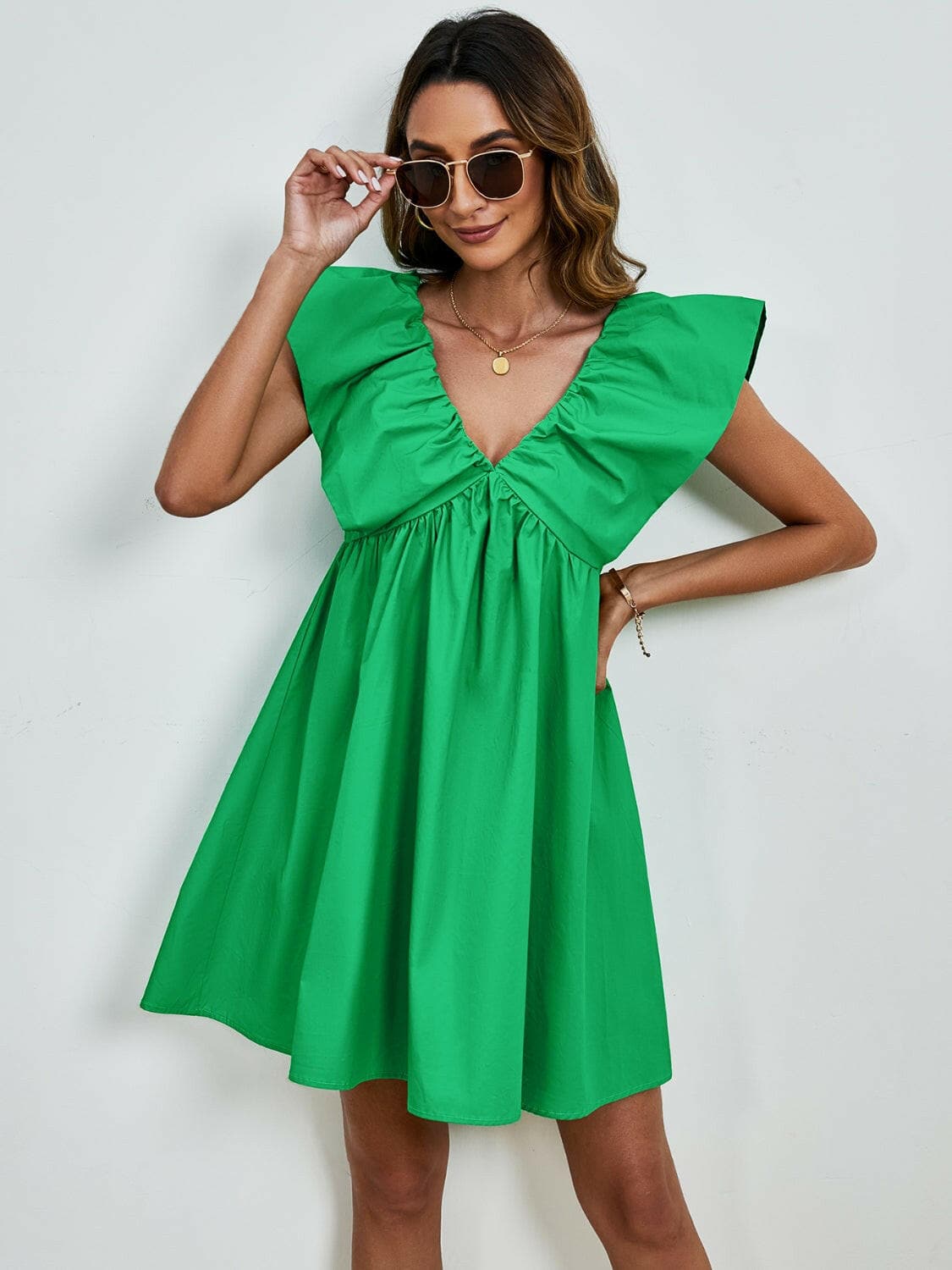 V-Neck Cap Sleeve Mini DressUpgrade Your Style with Our V-Neck Cap Sleeve Mini Dress
 Step out in confidence and elegance with our V-Neck Cap Sleeve Mini Dress, a versatile piece that effortlesLove Salve -Neck Cap Sleeve Mini Dress