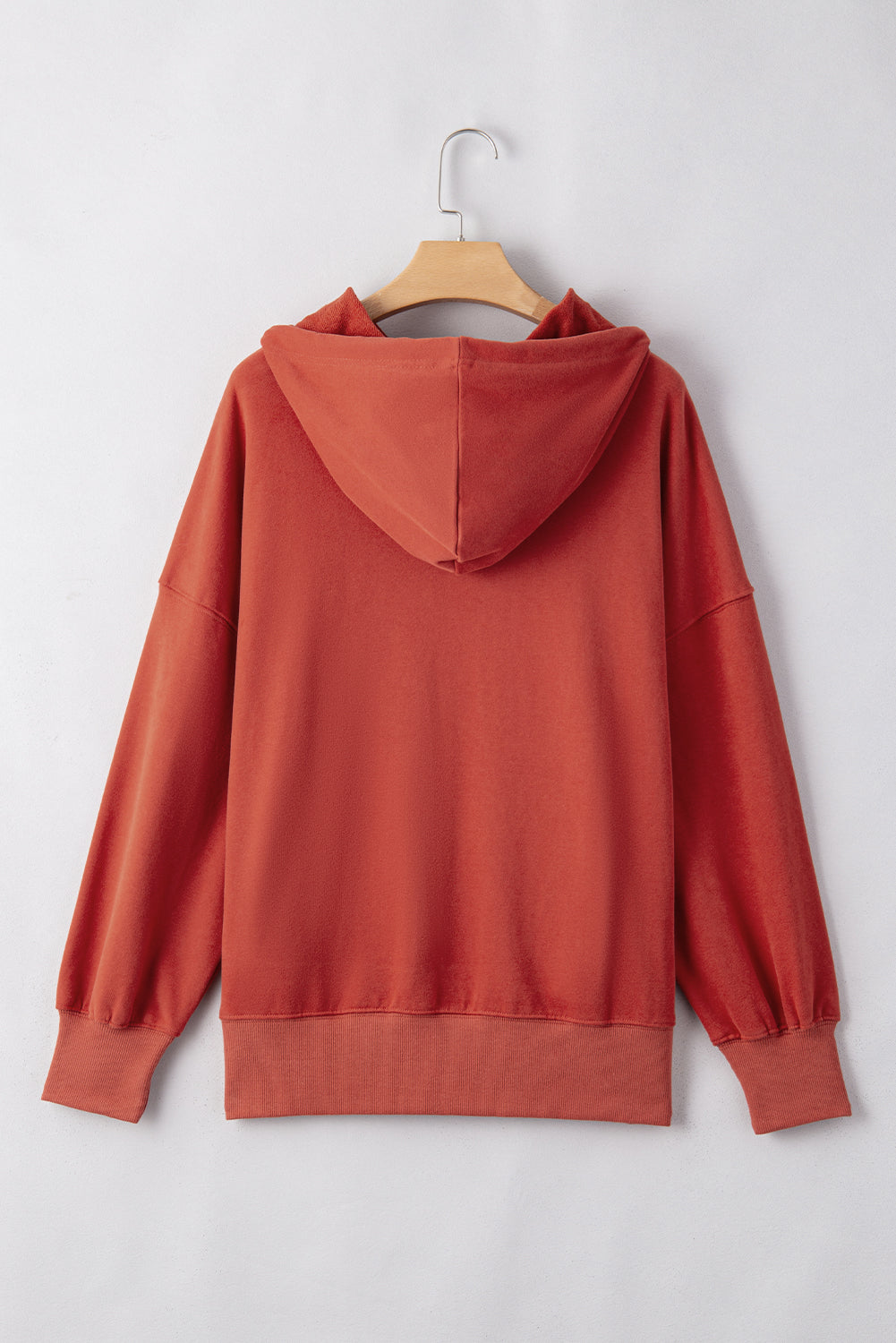 Cozy red clay oversized drawstring hoodie with pockets