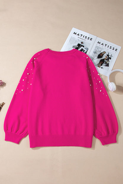 Chic strawberry pink plus size sweater with pearl accents and raglan sleeves