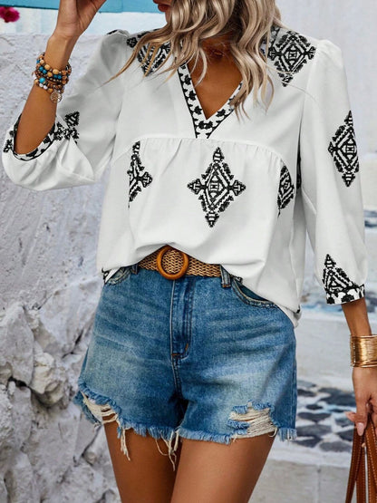 Printed V-Neck Three-Quarter Sleeve Blouse.