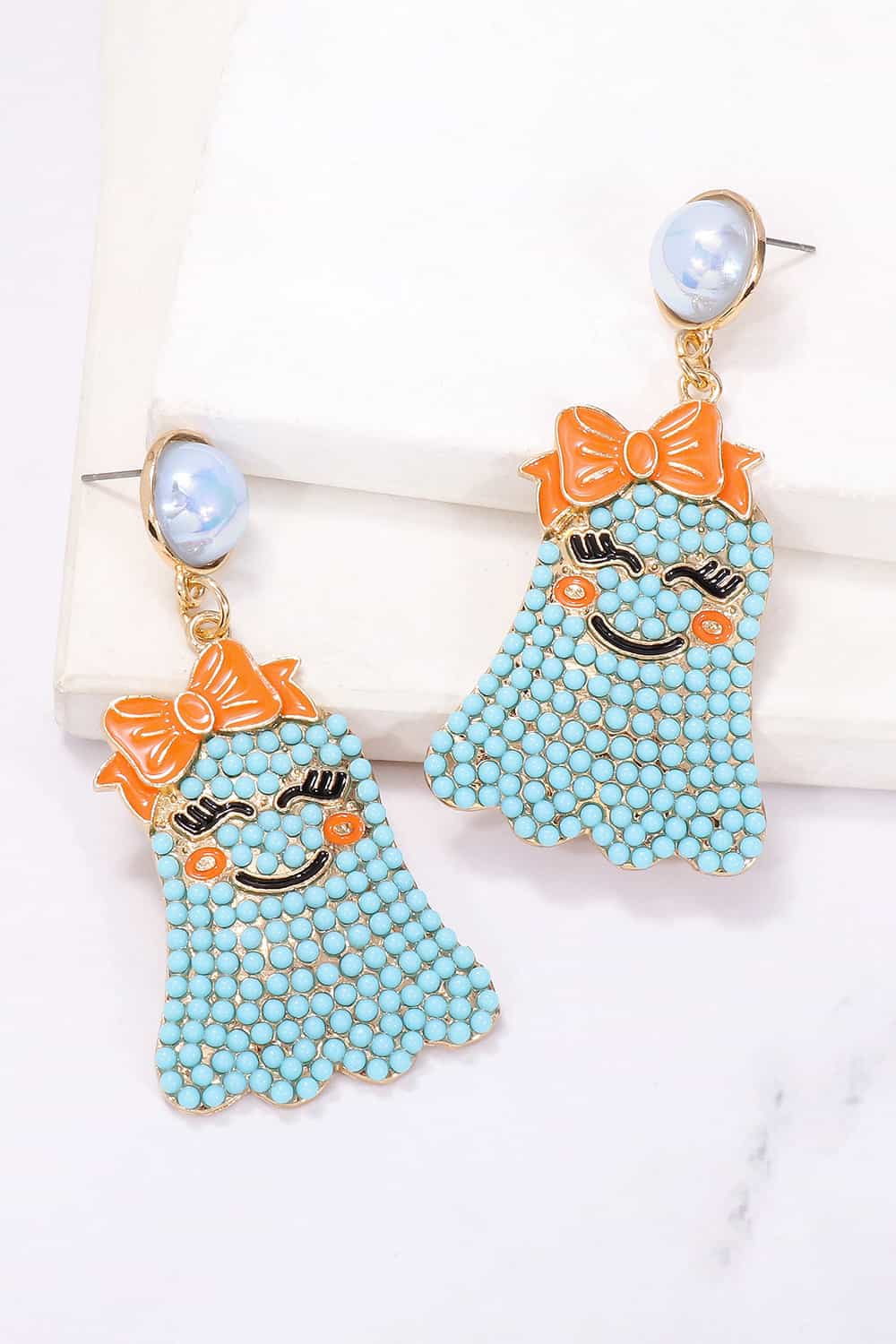 Charming ghost earrings with pearls