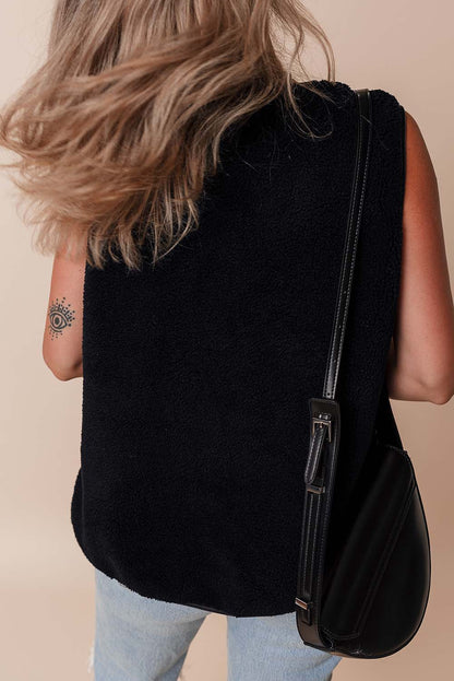 Sophisticated black fleece vest with button closure and side pockets