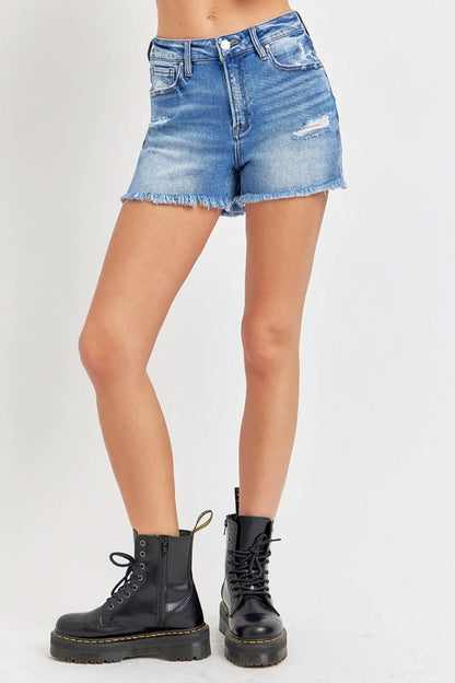 High rise distressed denim shorts with raw hem detail