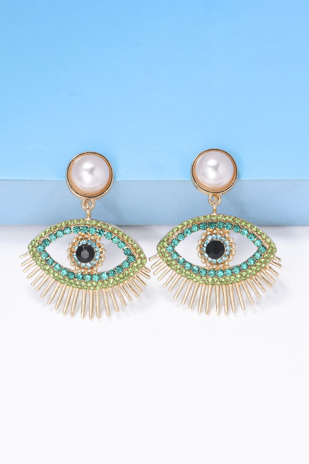 Rhinestone evil eye earrings