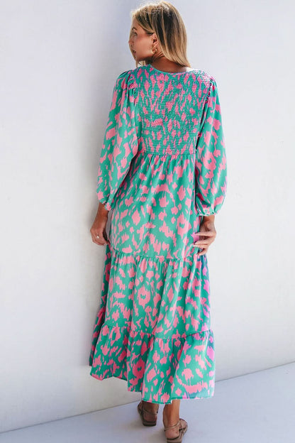 Floral smocked tie neck long sleeve dress