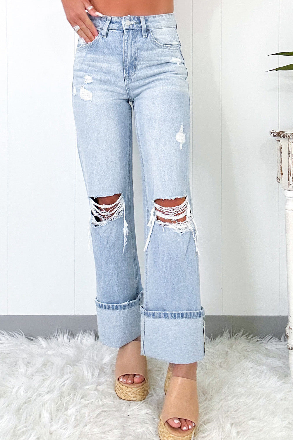 Beau distressed light wash flare jeans with vintage charm