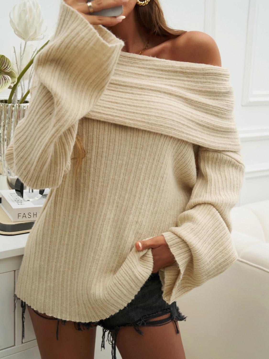 Off-Shoulder Extra-Long Sleeve Sweater.