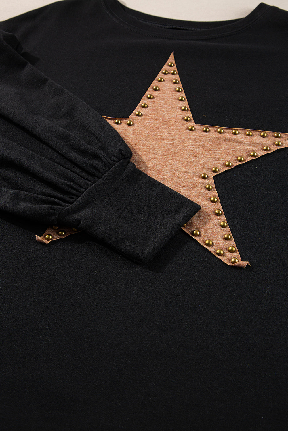 Starry night oversized long sleeve top with studded details