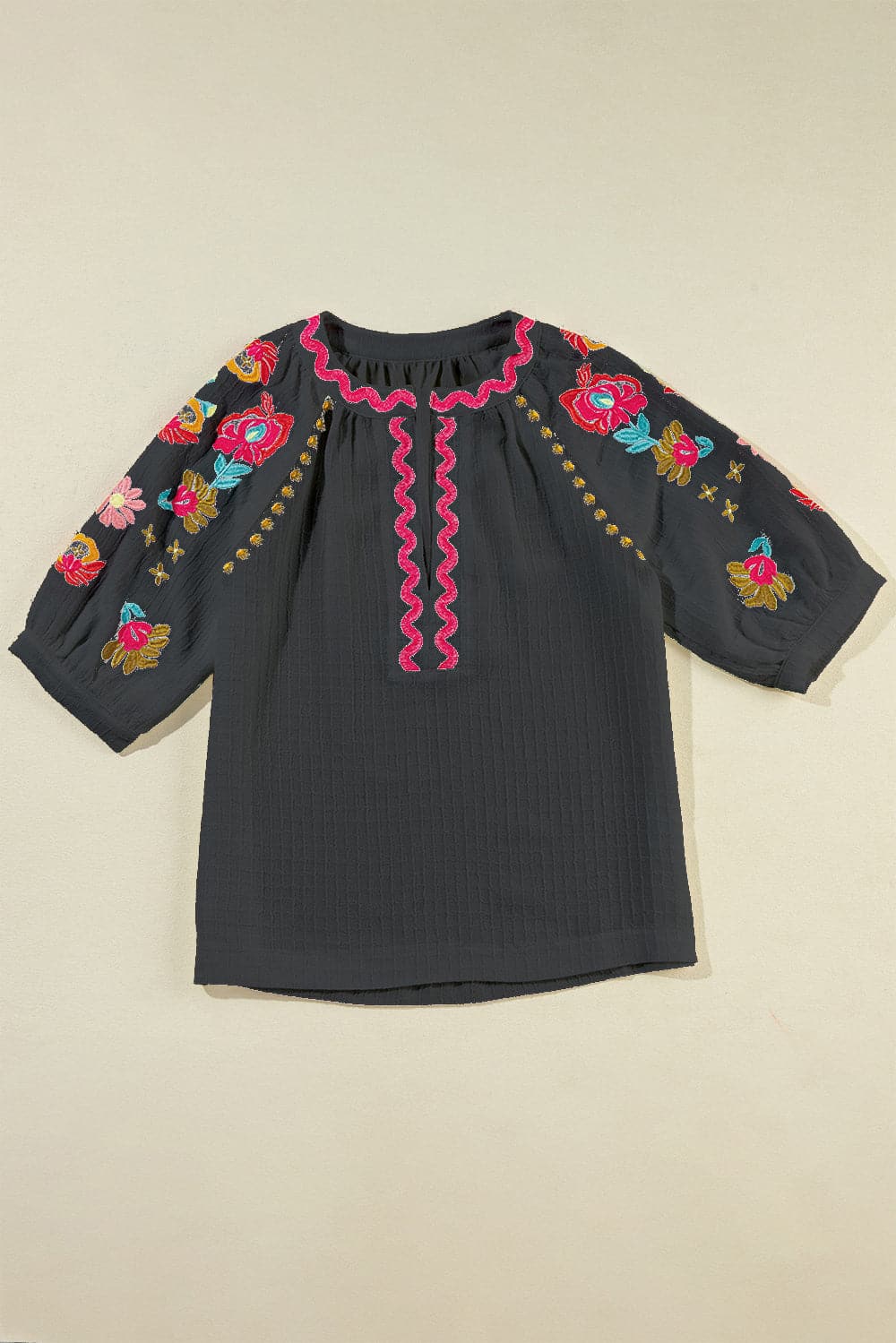 Embroidered Notched Half Sleeve Blouse.