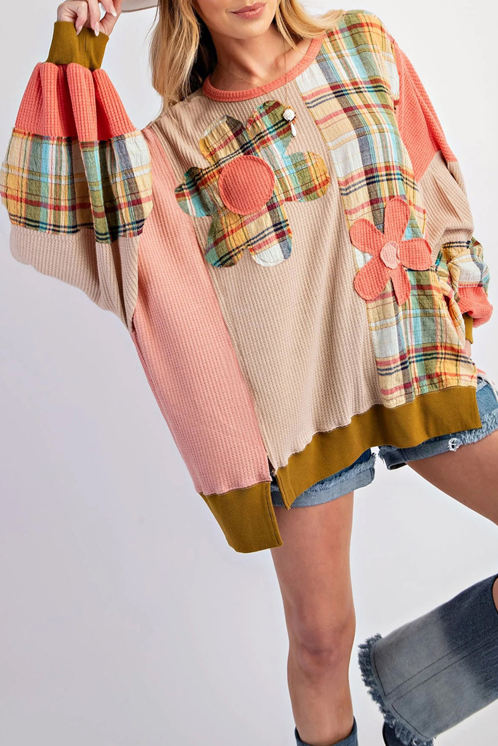 Multicolour waffle knit plaid patchwork sweatshirt with side slits and loose fit.