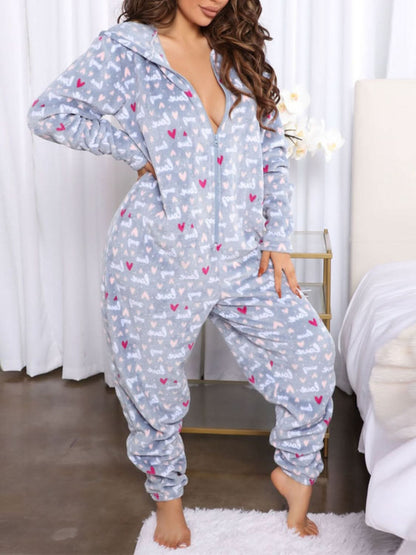 Chic printed hooded jumpsuit with pockets and stretch comfort