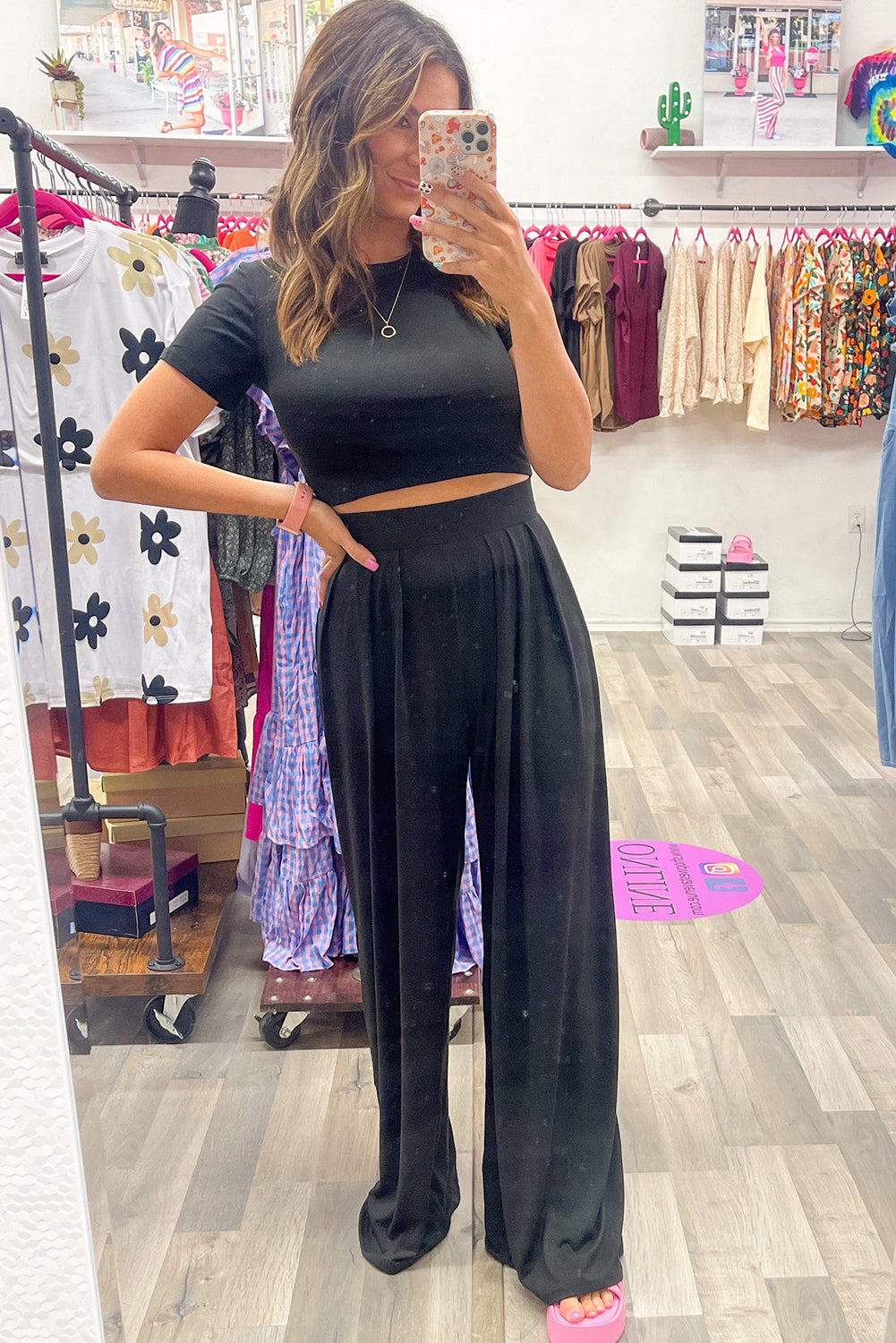 Chic black crop top and wide leg pants ensemble