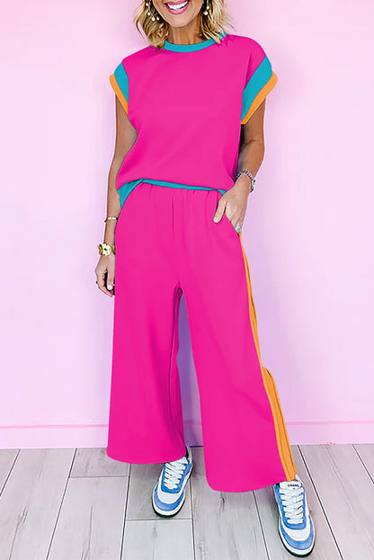 Striking strawberry pink color block casual two-piece ensemble