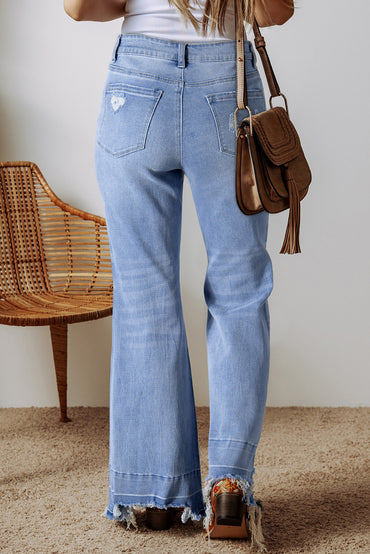 Ashleigh blue high-waisted flared jeans with raw hem detail