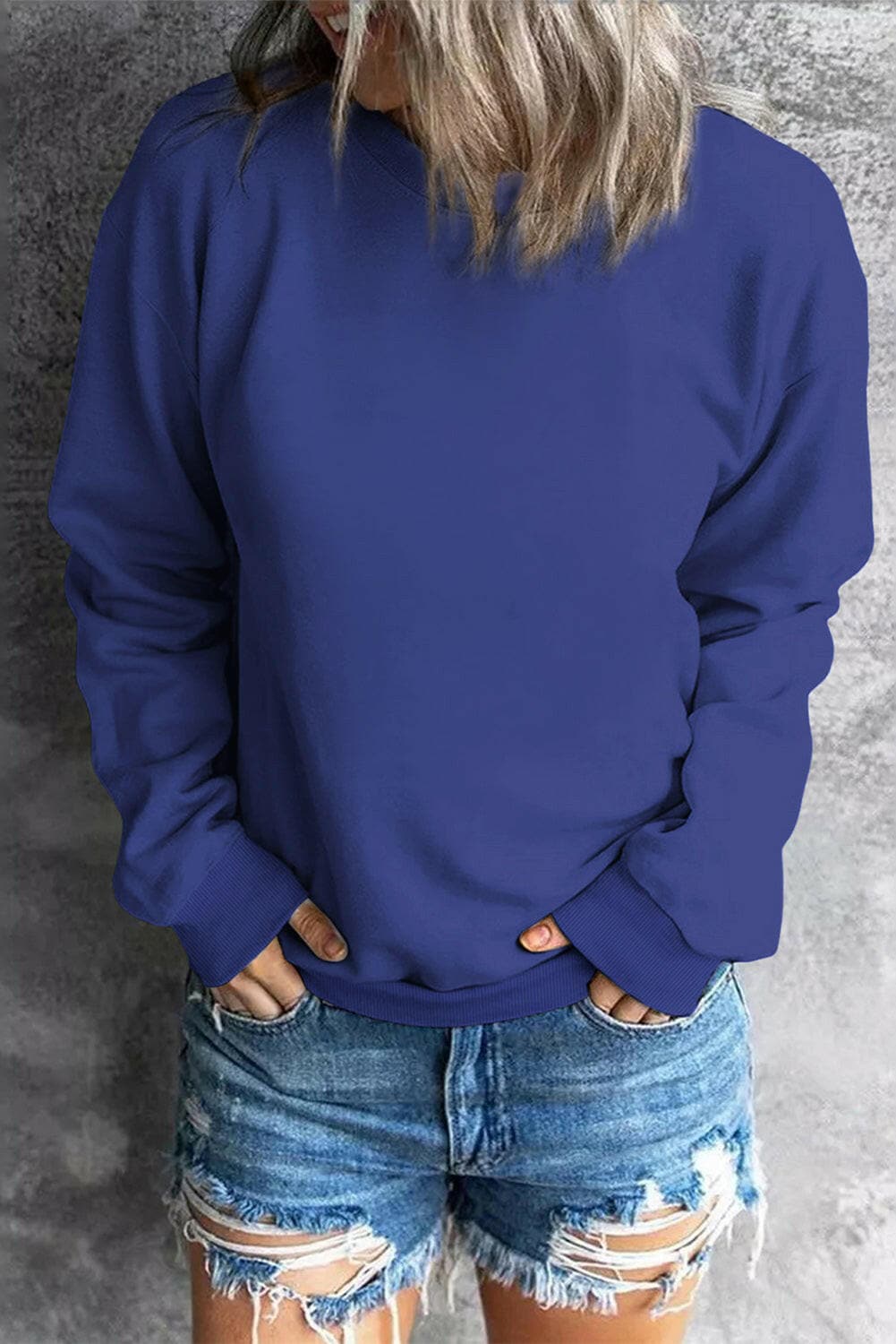 Round Neck Dropped Shoulder Sweatshirt.