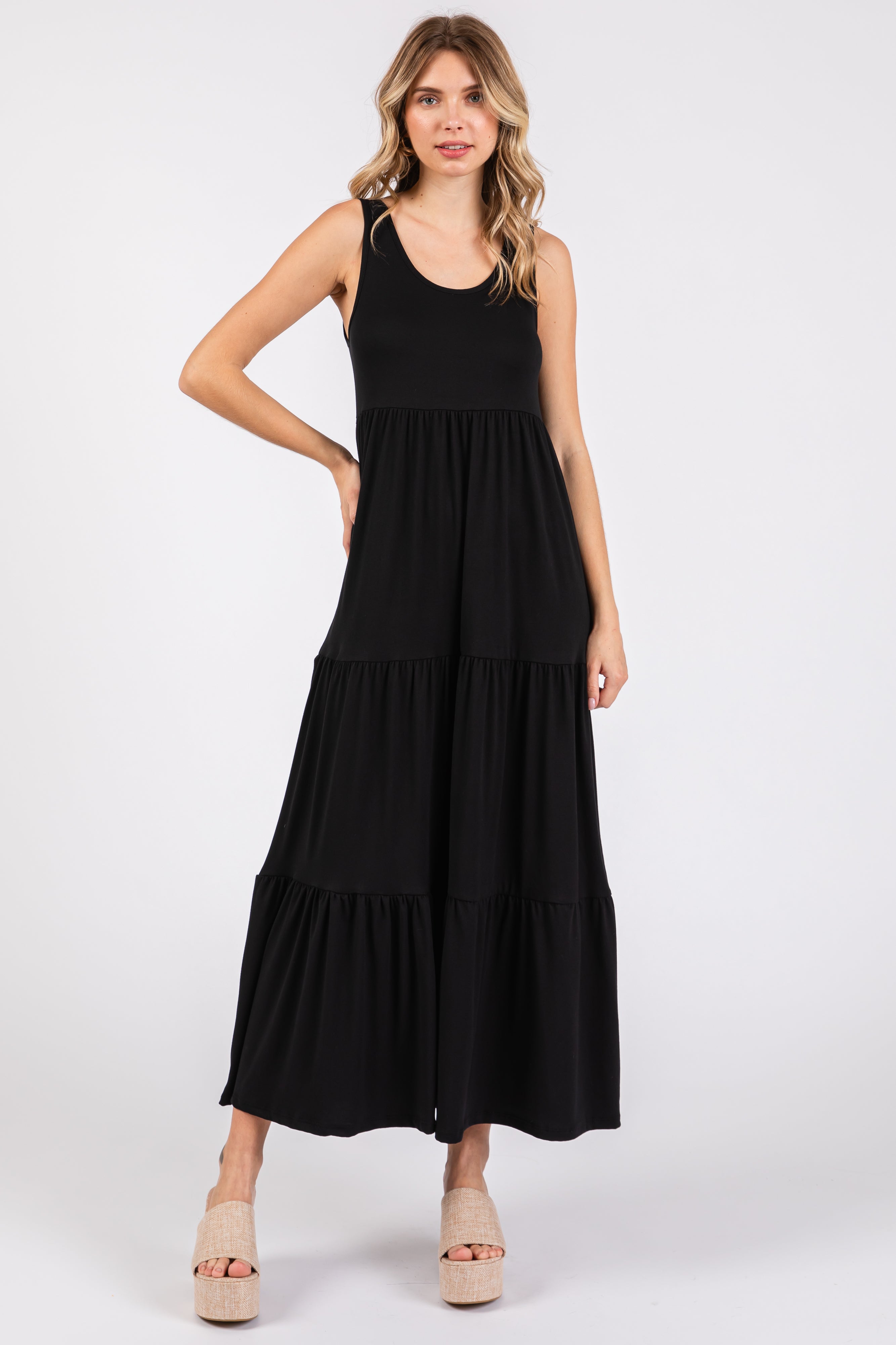PinkBlush Black Sleeveless Maternity Maxi Dress, styled on a model, highlighting its comfortable fit and graceful drape.